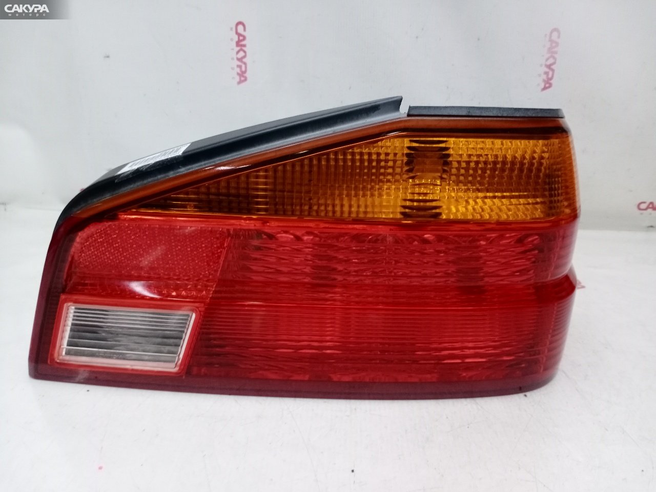 Фонарь стоп-сигнала правый Nissan Laurel HC35 RB20DE 4789: купить в Сакура Красноярск.