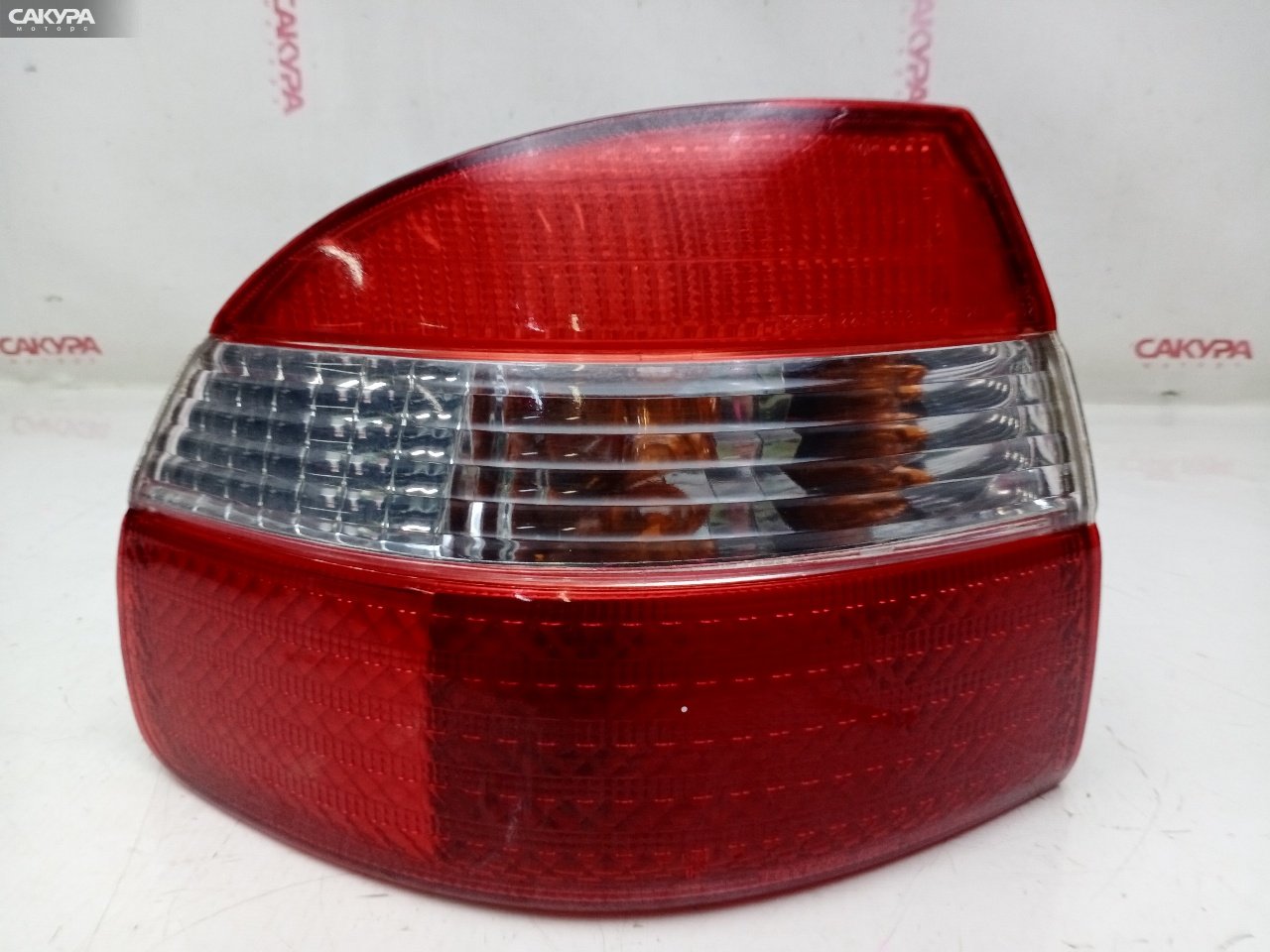 Фонарь стоп-сигнала левый Toyota Corolla AE110 5A-FE 12-442: купить в Сакура Красноярск.