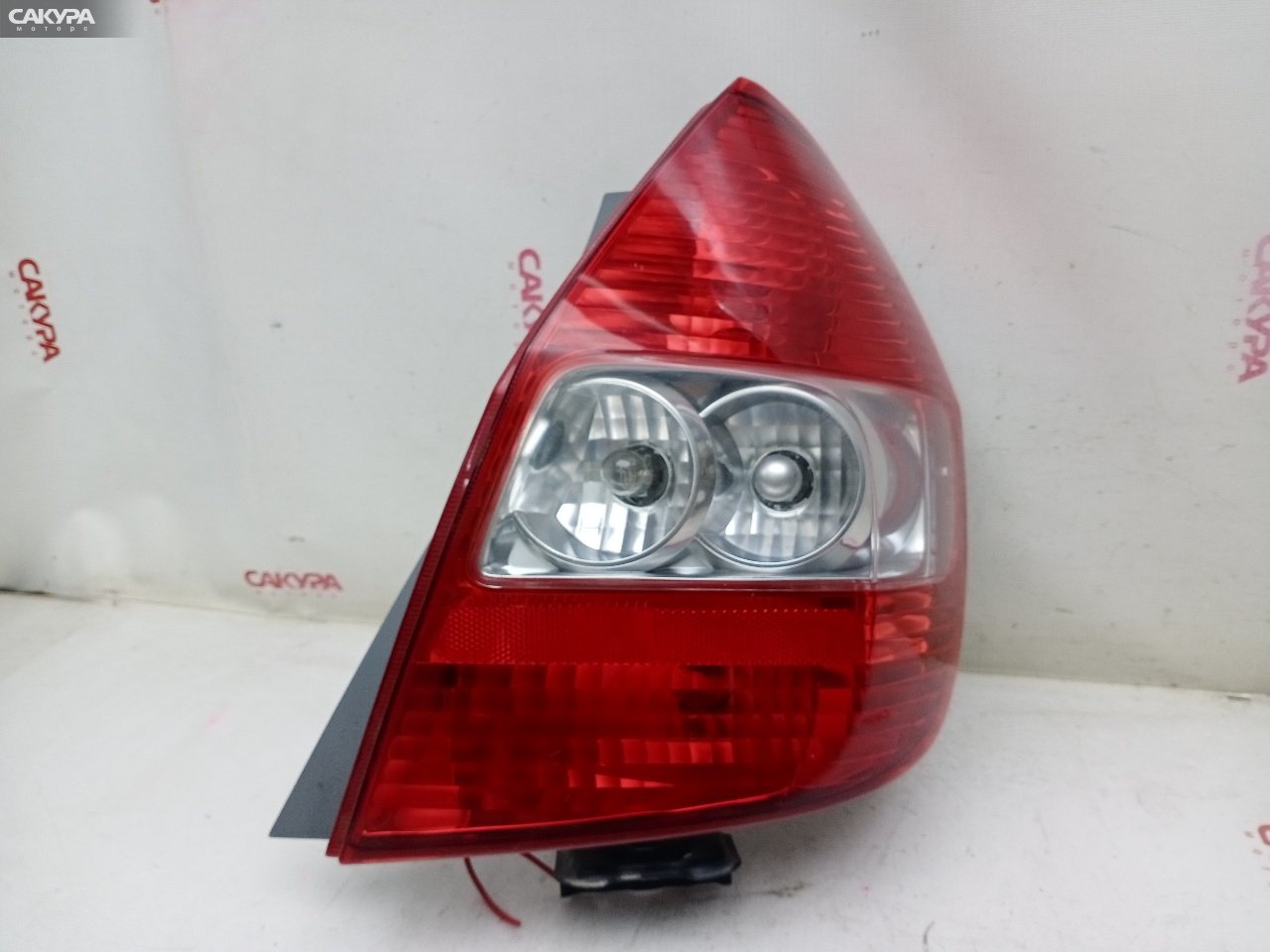 Фонарь стоп-сигнала правый Honda FIT GD1 L13A 4949: купить в Сакура Красноярск.
