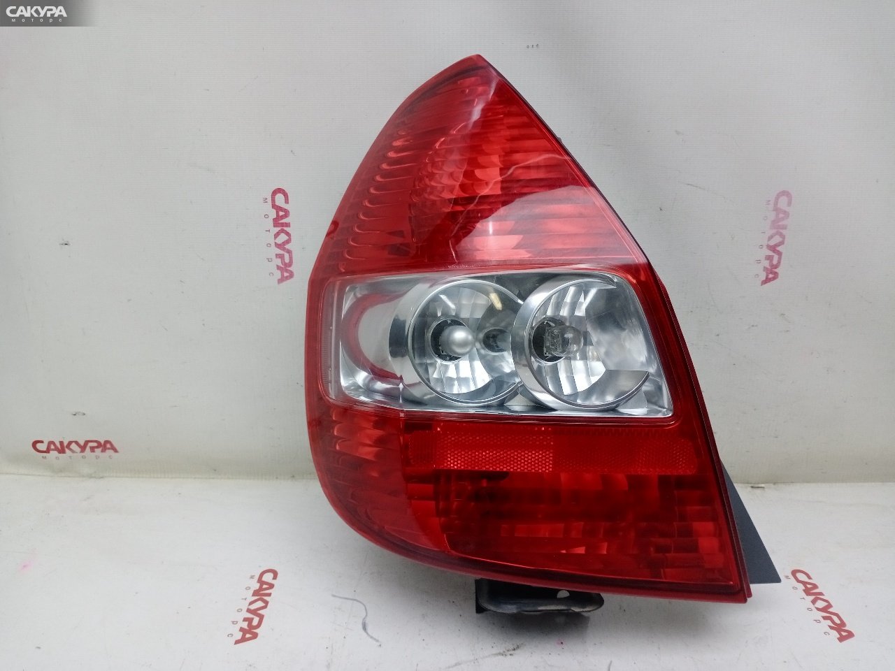 Фонарь стоп-сигнала левый Honda FIT GD1 L13A 4949: купить в Сакура Красноярск.