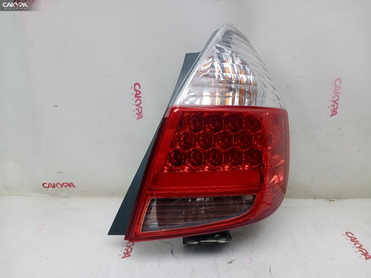 Фонарь стоп-сигнала правый Honda FIT GD1 L13A 4995: купить в Сакура Красноярск.