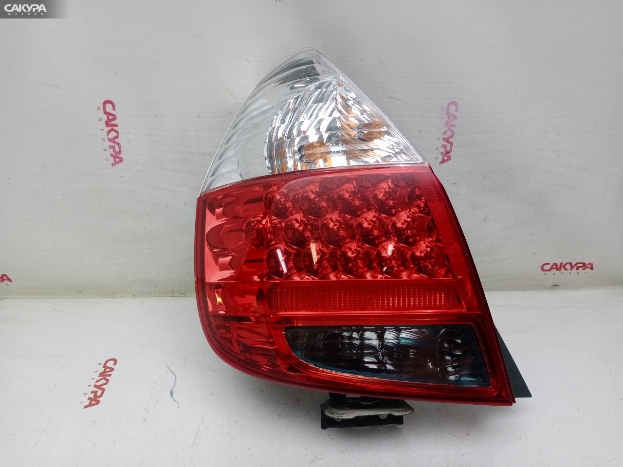 Фонарь стоп-сигнала левый Honda FIT GD1 L13A 4995: купить в Сакура Красноярск.