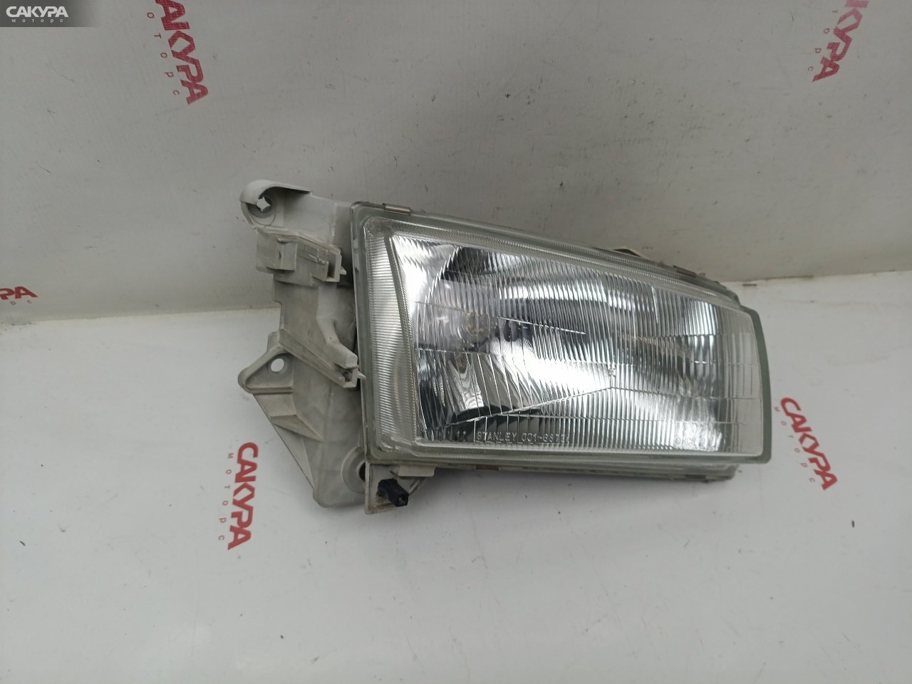 Фара правая Mazda Demio DW5W B5-ME 001-6872: купить в Сакура Красноярск.