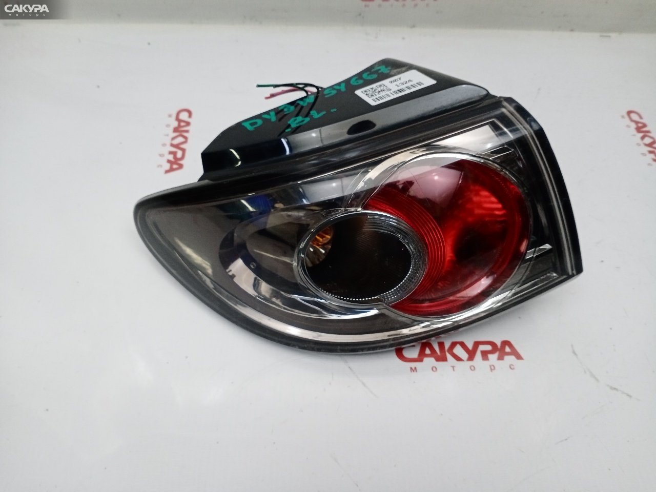 Фонарь стоп-сигнала левый Mazda Demio DY3W ZJ-VE P4419: купить в Сакура Красноярск.