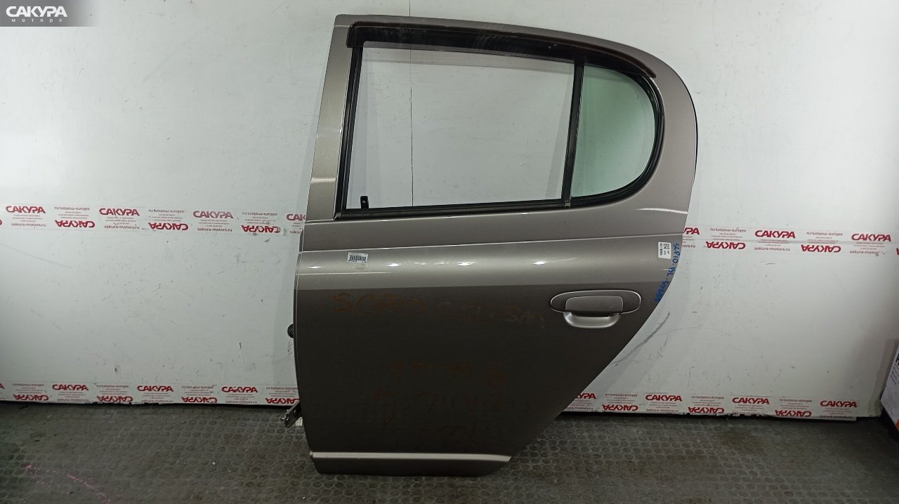 Дверь боковая задняя левая Toyota Vitz SCP10 1SZ-FE: купить в Сакура Красноярск.