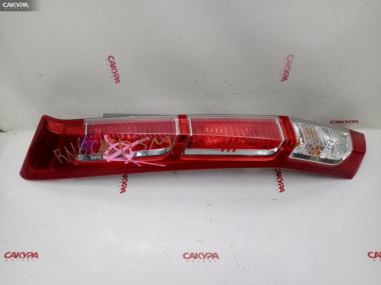 Фонарь стоп-сигнала левый Honda Stream RN6 R18A D079: купить в Сакура Красноярск.