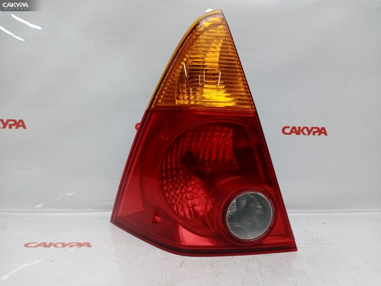 Фонарь стоп-сигнала левый Daihatsu YRV M201G K3-VE 220-51674: купить в Сакура Красноярск.