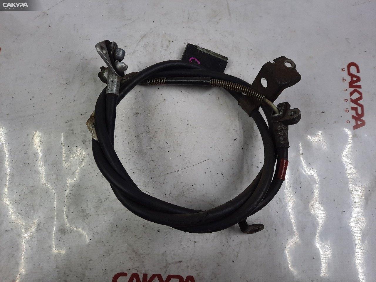 Трос ручника правый Toyota Vitz SCP10: купить в Сакура Красноярск.