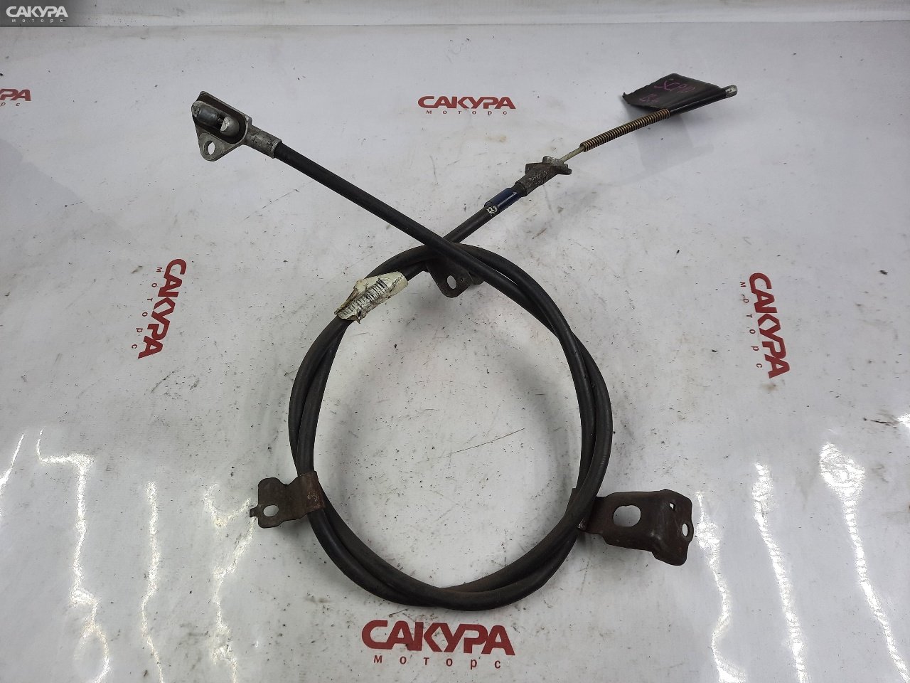 Трос ручника левый Toyota Vitz SCP10: купить в Сакура Красноярск.