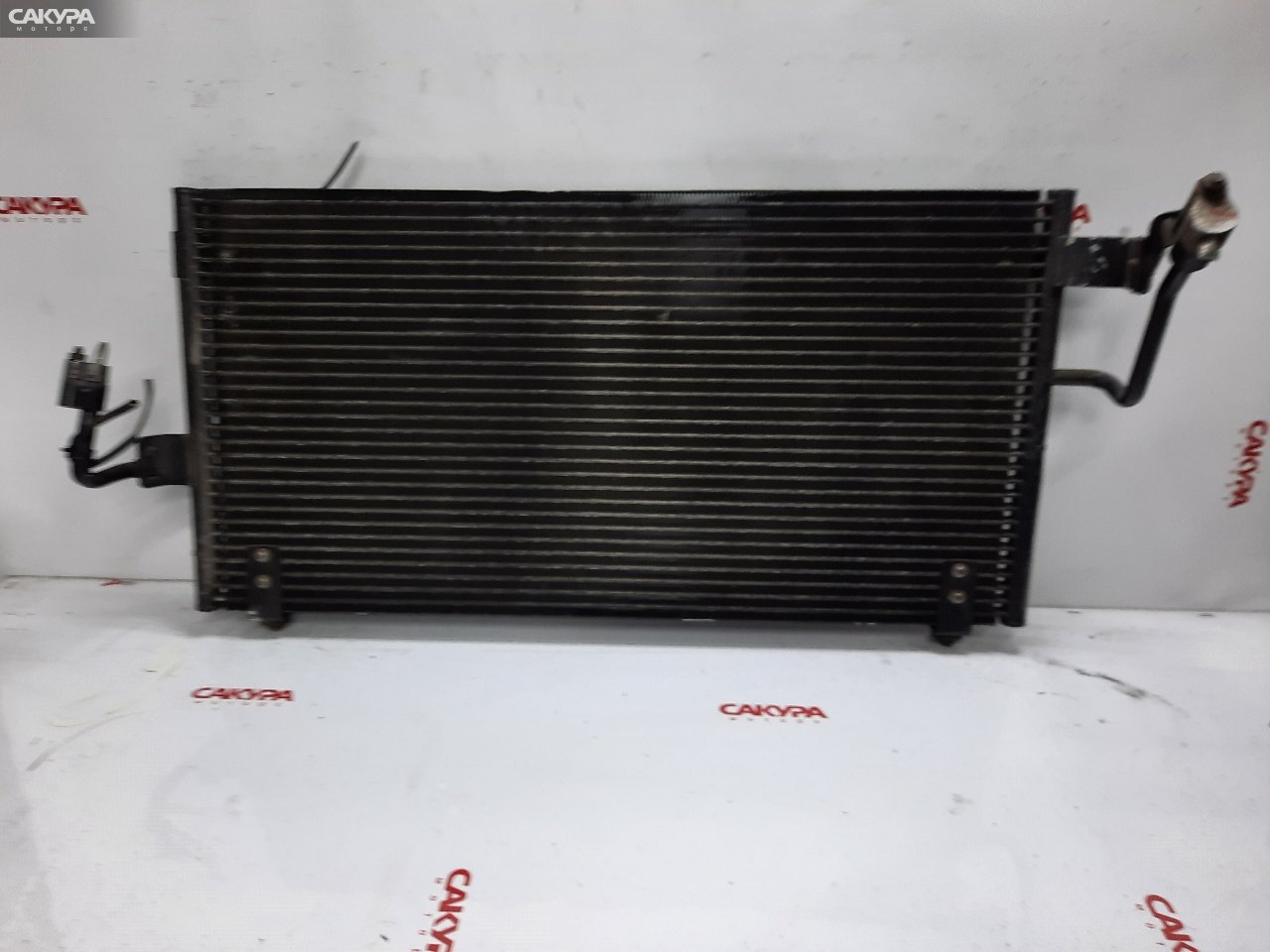 Радиатор кондиционера Mitsubishi Diamante F31A 6G73: купить в Сакура Красноярск.
