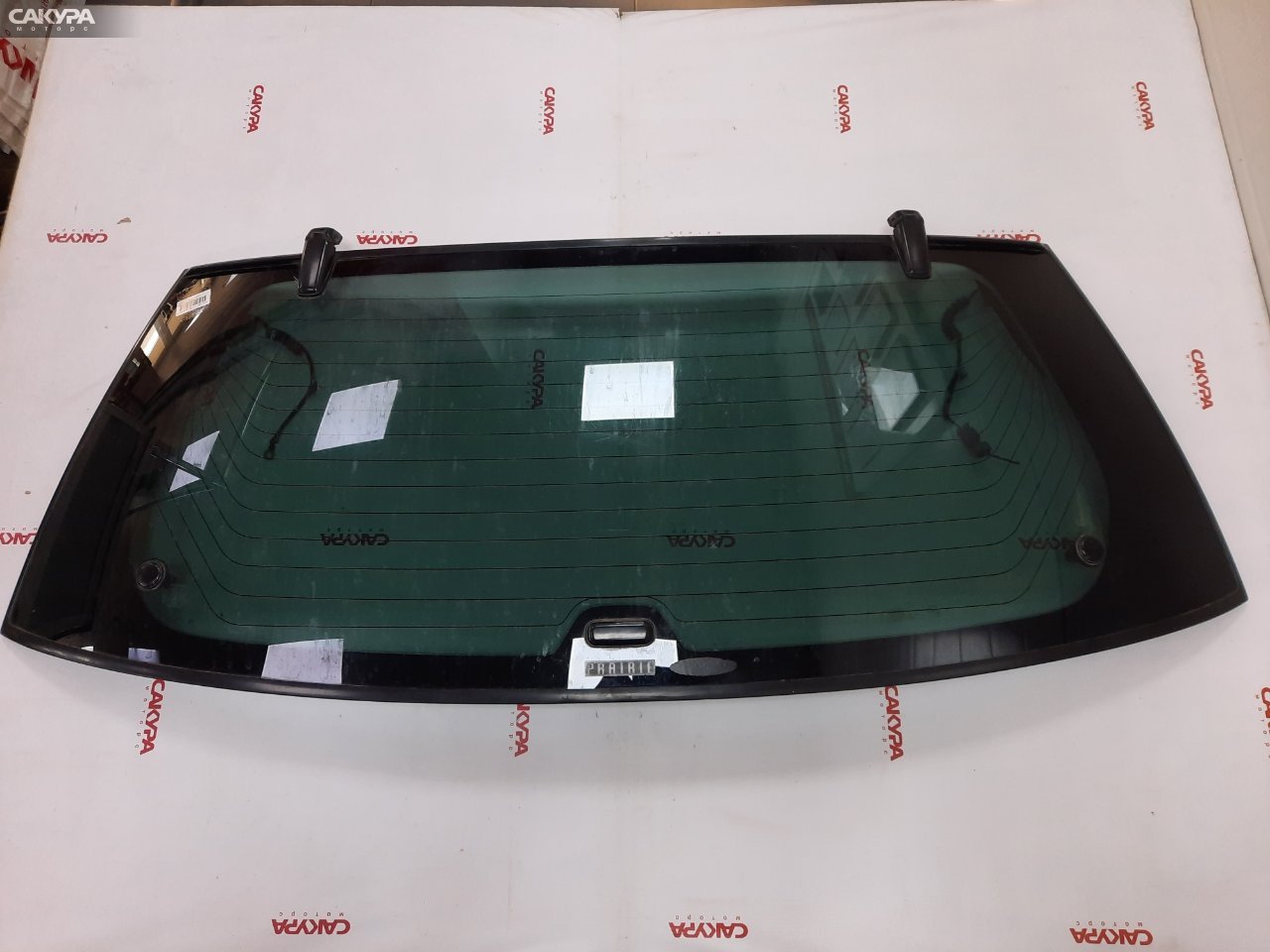 Стекло заднее заднее Nissan Liberty PM12 SR20DE: купить в Сакура Красноярск.