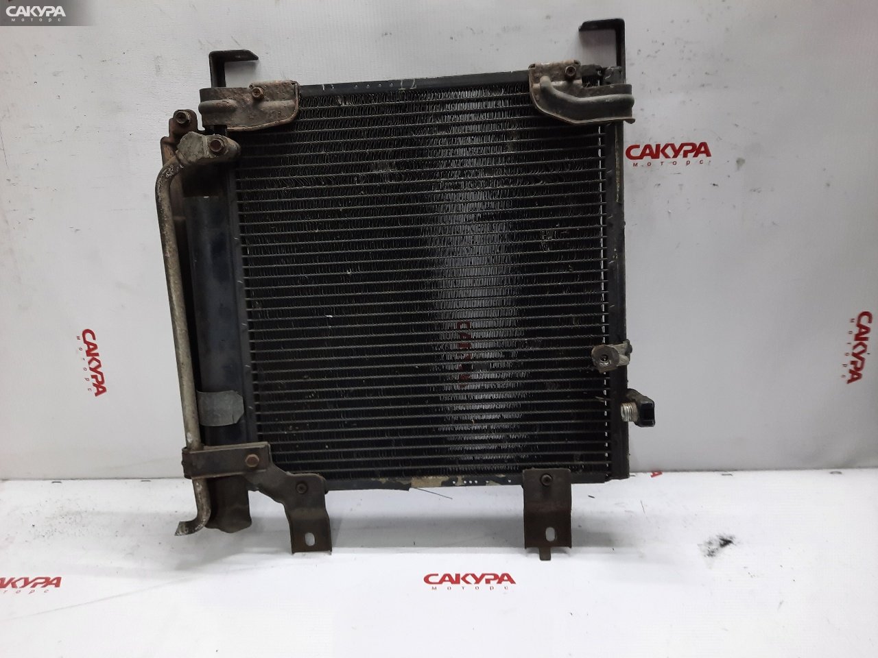 Радиатор кондиционера Toyota Duet M100A EJ-DE: купить в Сакура Красноярск.