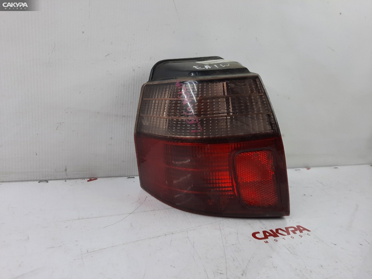 Фонарь стоп-сигнала левый Mitsubishi Legnum EC1W 220-87201: купить в Сакура Красноярск.