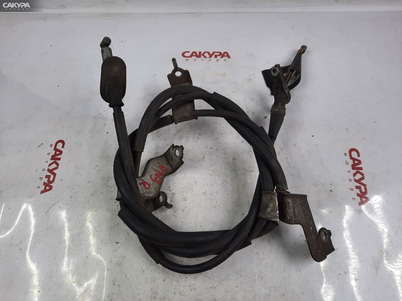 Трос ручника правый Honda Stream RN3 K20A: купить в Сакура Красноярск.