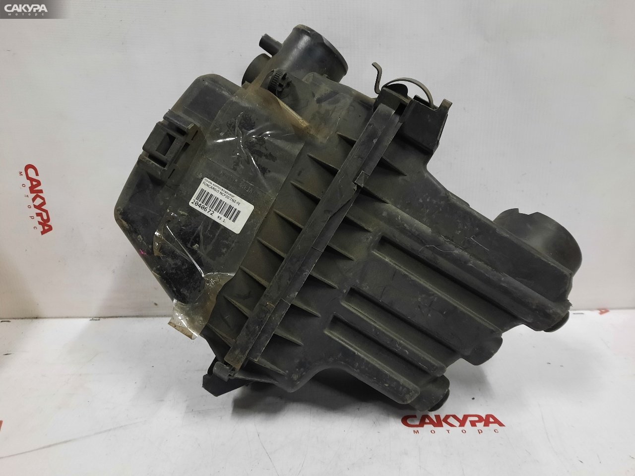 Корпус воздушного фильтра Toyota Funcargo NCP20 2NZ-FE: купить в Сакура Красноярск.