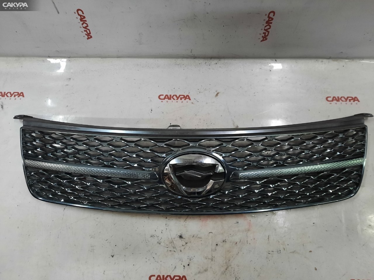 Решетка радиатора Toyota Corolla Fielder NZE141G 1NZ-FE: купить в Сакура Красноярск.
