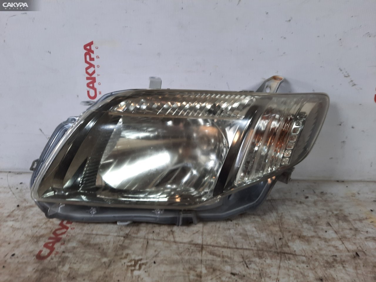 Фара левая Toyota Corolla Fielder NZE141 1NZ-FE 13-98: купить в Сакура Красноярск.