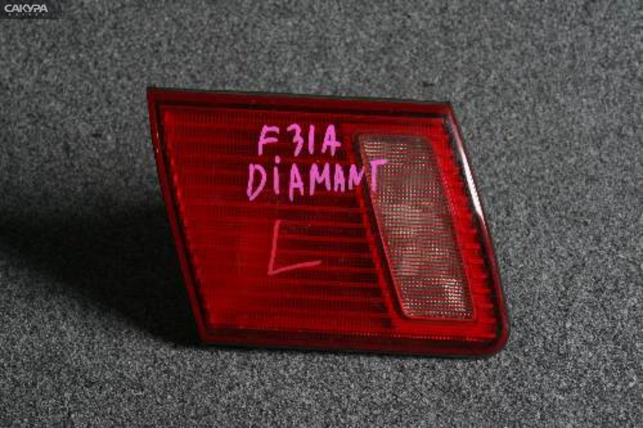 Фонарь вставка багажника левый Mitsubishi Diamante F31A 043-1656: купить в Сакура Красноярск.