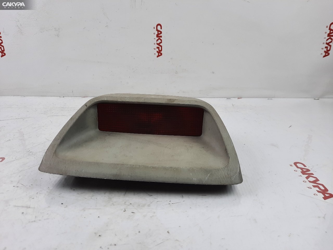 Фонарь стоп-сигнала Mazda Familia BJ3P -: купить в Сакура Красноярск.