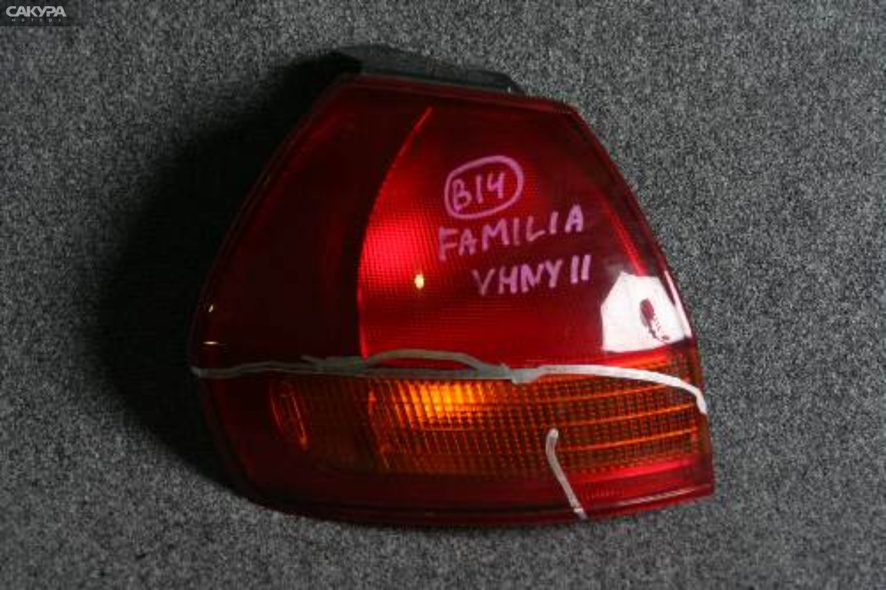 Фонарь стоп-сигнала левый Mazda Familia VHNY11 220-24765: купить в Сакура Красноярск.