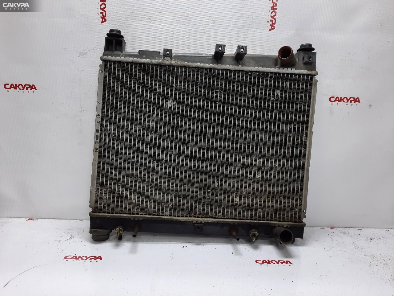 Радиатор двигателя Toyota Platz NCP16 2NZ-FE: купить в Сакура Красноярск.