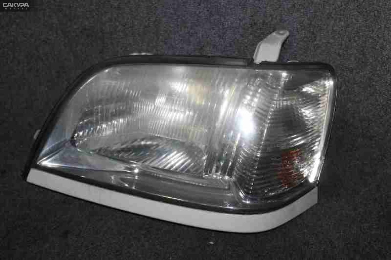 Фара левая Toyota Crown JZS175 100-76941: купить в Сакура Красноярск.