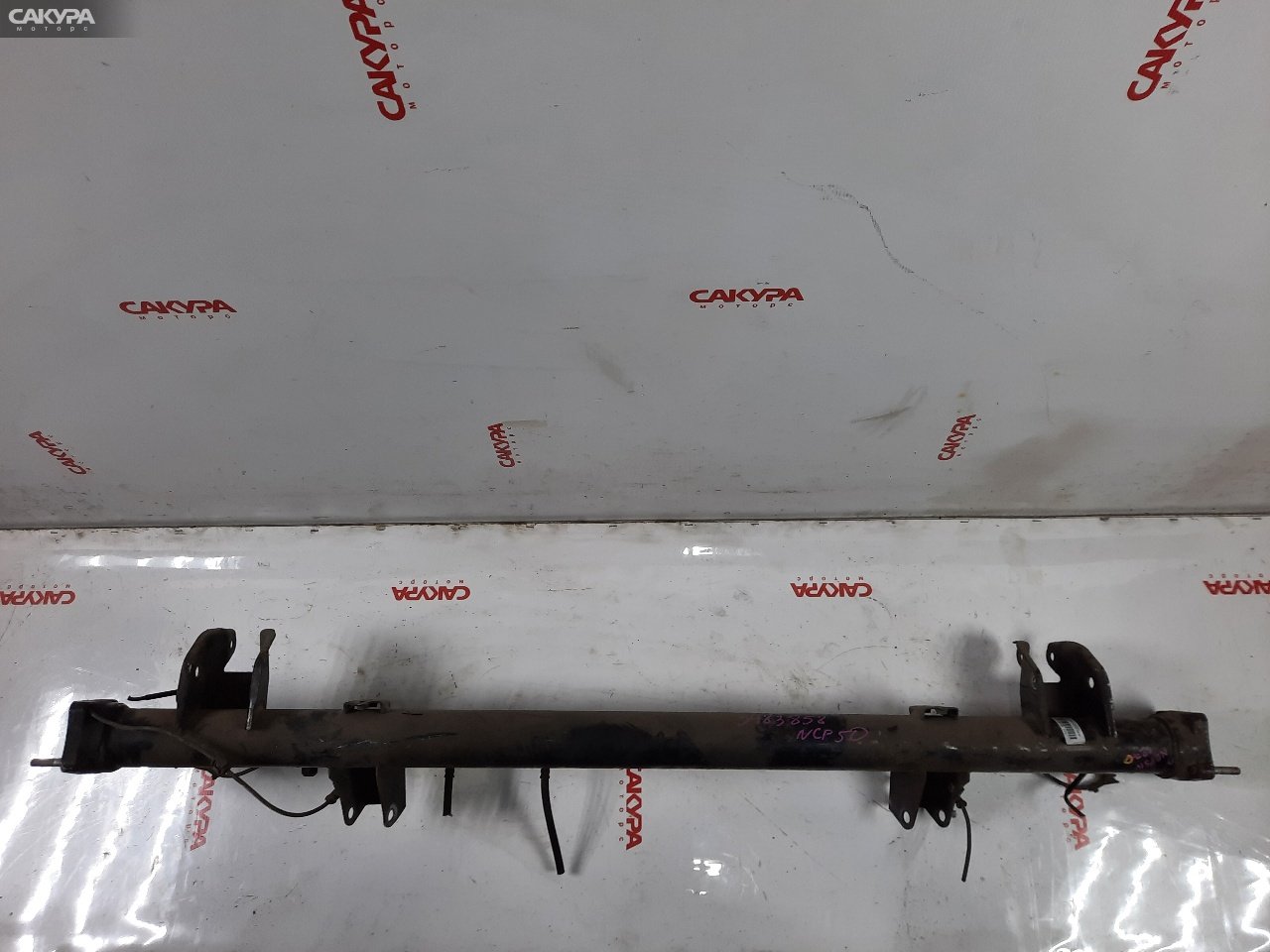 Балка поперечная задняя Toyota Probox NCP50V 2NZ-FE: купить в Сакура Красноярск.