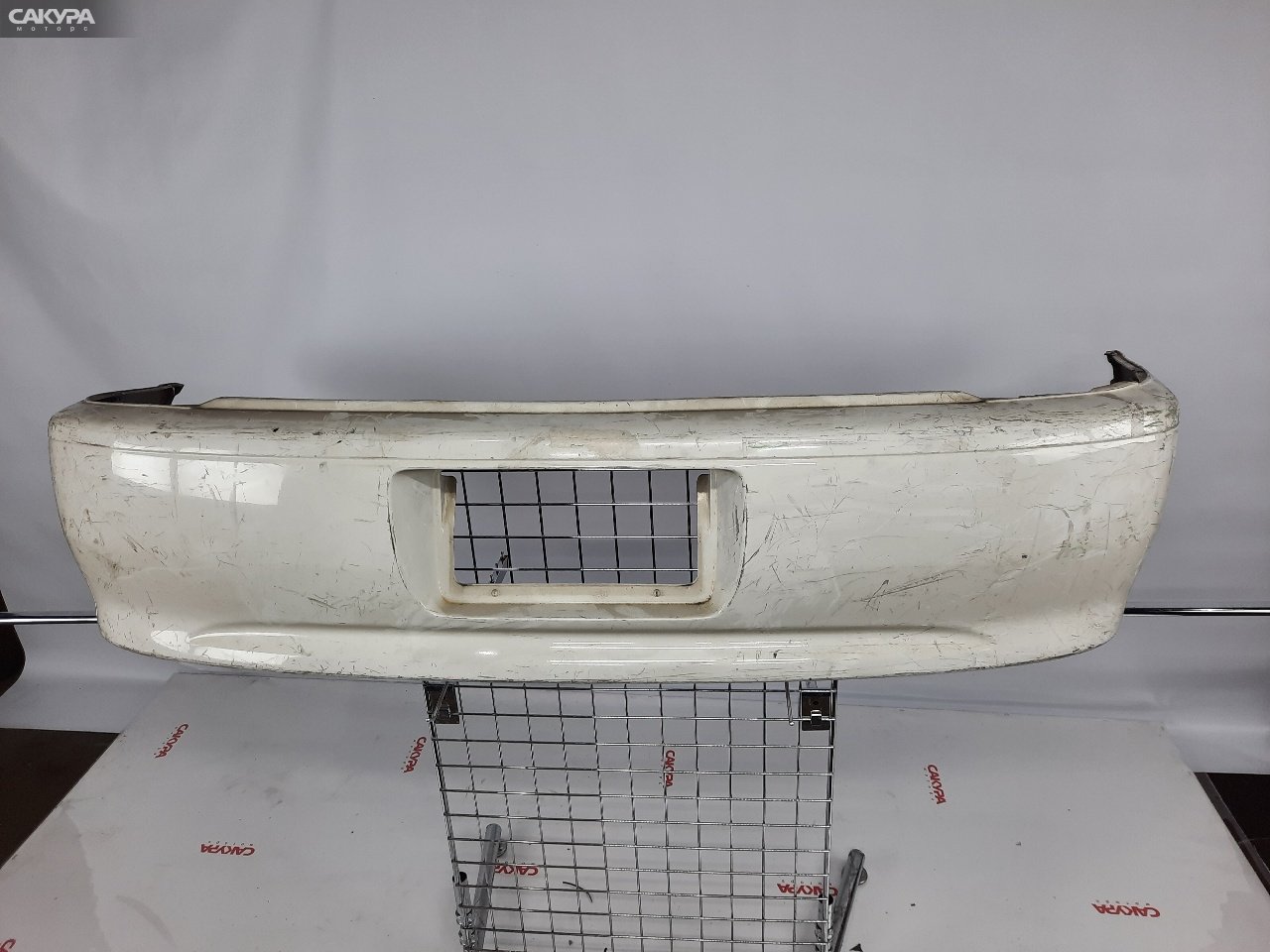 Бампер задний Toyota Corolla Spacio AE115N 7A-FE Y1A4A2Y1: купить в Сакура Красноярск.