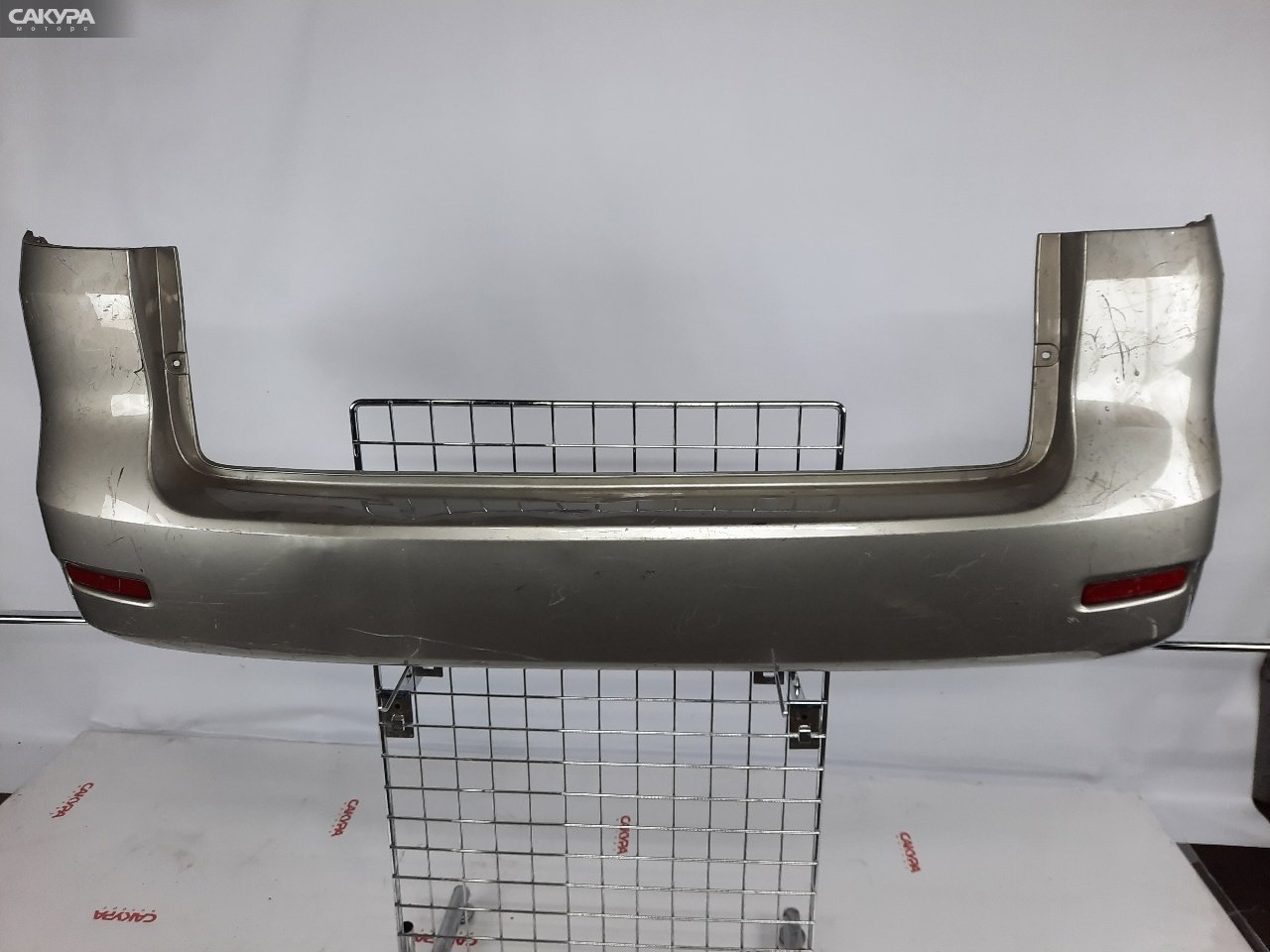 Бампер задний Toyota Corolla Spacio NZE121N 1NZ-FE U2U1A4A2: купить в Сакура Красноярск.