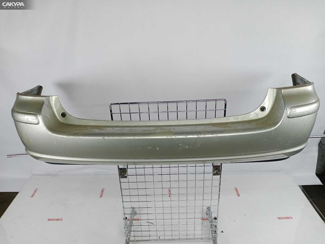 Бампер задний Toyota Avensis AZT250 1AZ-FSE A2A2: купить в Сакура Красноярск.