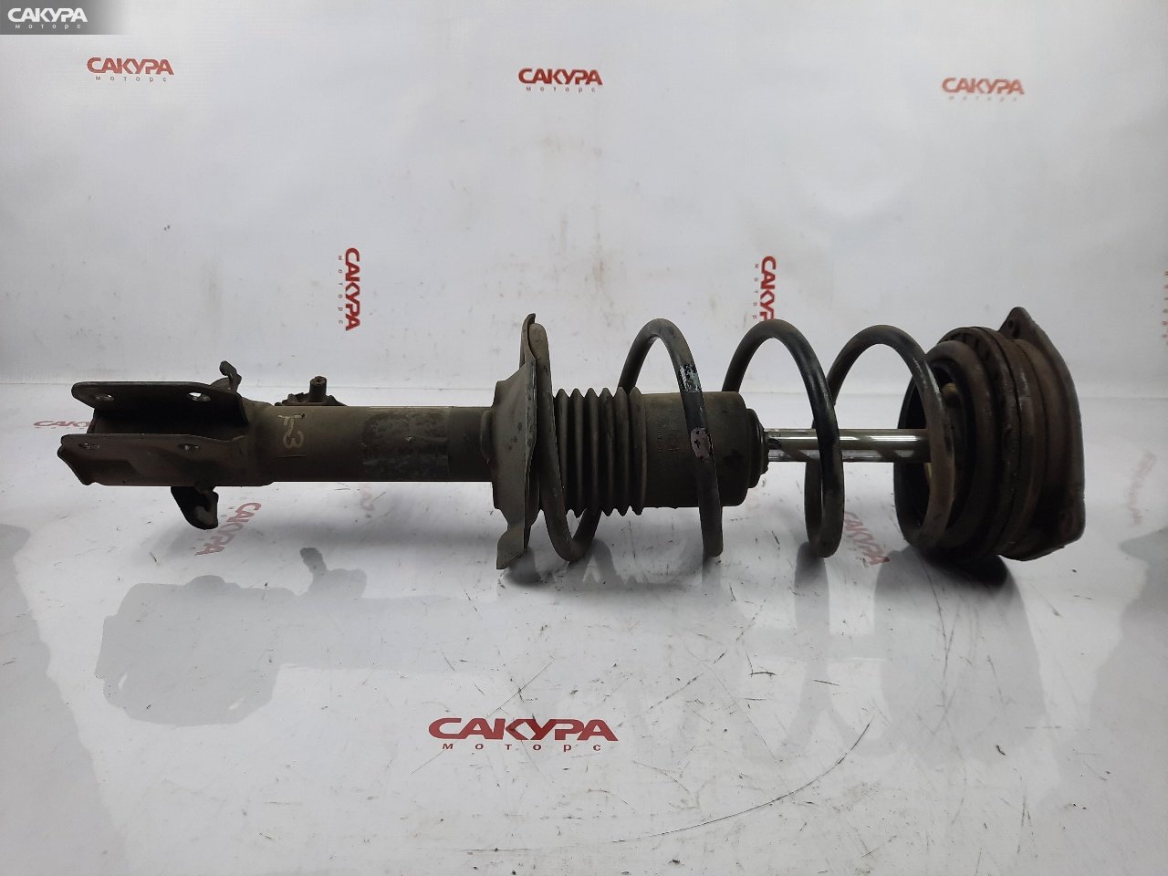 Стойка подвески передняя левая Nissan March AK12 CR12DE: купить в Сакура Красноярск.