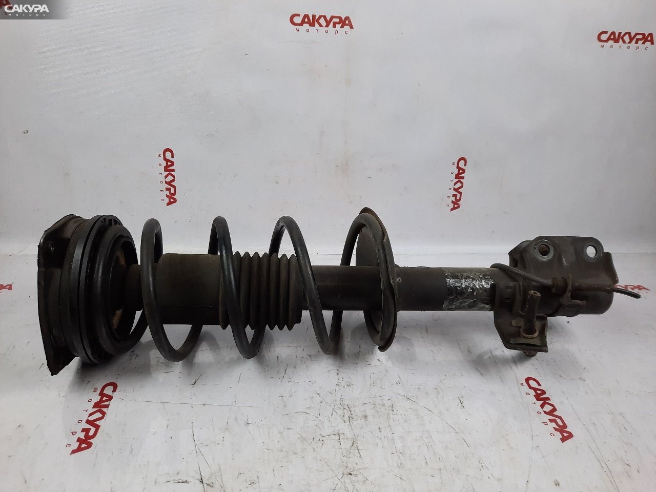Стойка подвески передняя левая Nissan March AK12 CR12DE: купить в Сакура Красноярск.