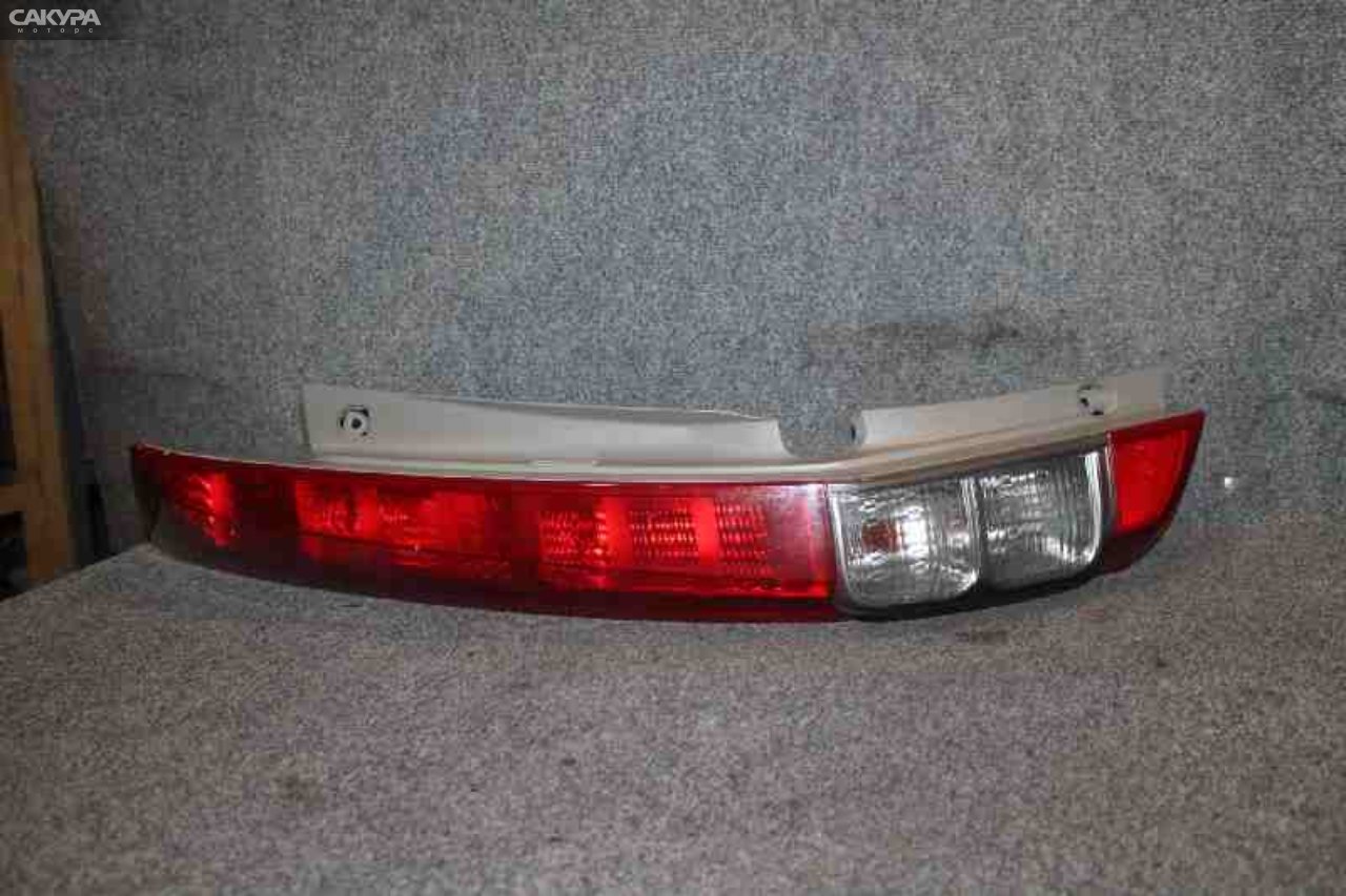 Фонарь стоп-сигнала левый Honda Stream RN6 R18A D038: купить в Сакура Красноярск.