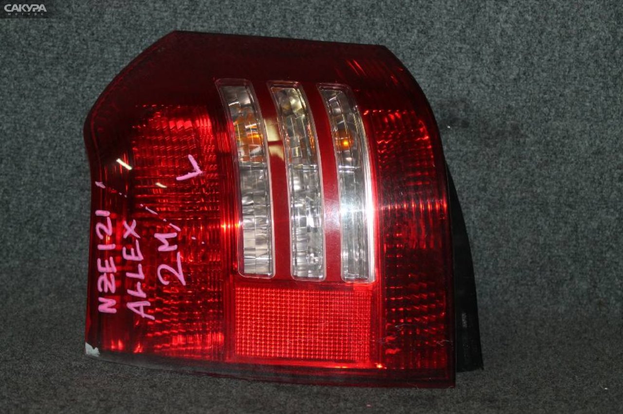 Фонарь стоп-сигнала левый Toyota Corolla Runx NZE121 1NZ-FE 13-77: купить в Сакура Красноярск.
