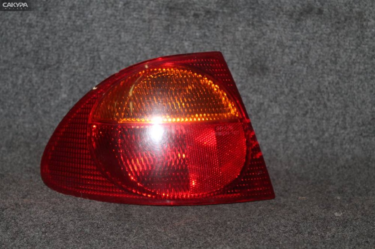 Фонарь стоп-сигнала левый Toyota Caldina ST215 21-36: купить в Сакура Красноярск.
