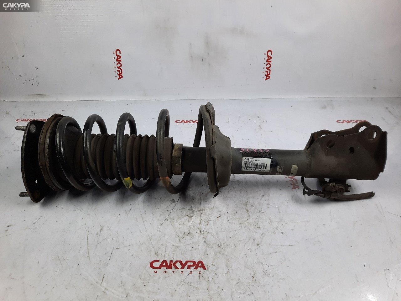 Стойка подвески передняя Toyota Vitz SCP13 2SZ-FE: купить в Сакура Красноярск.