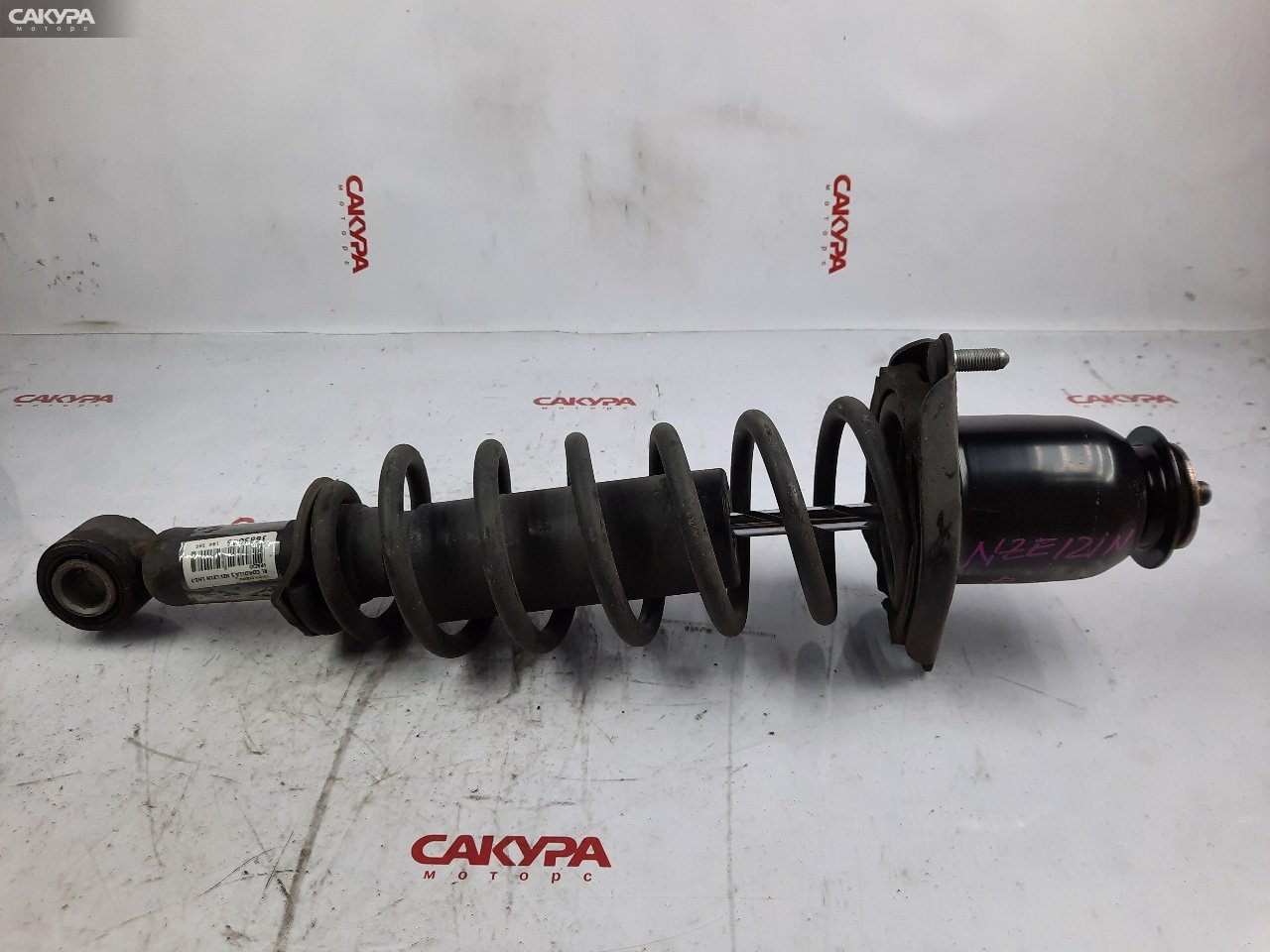 Стойка подвески задняя левая Toyota Corolla Spacio NZE121N 1NZ-FE: купить в Сакура Красноярск.