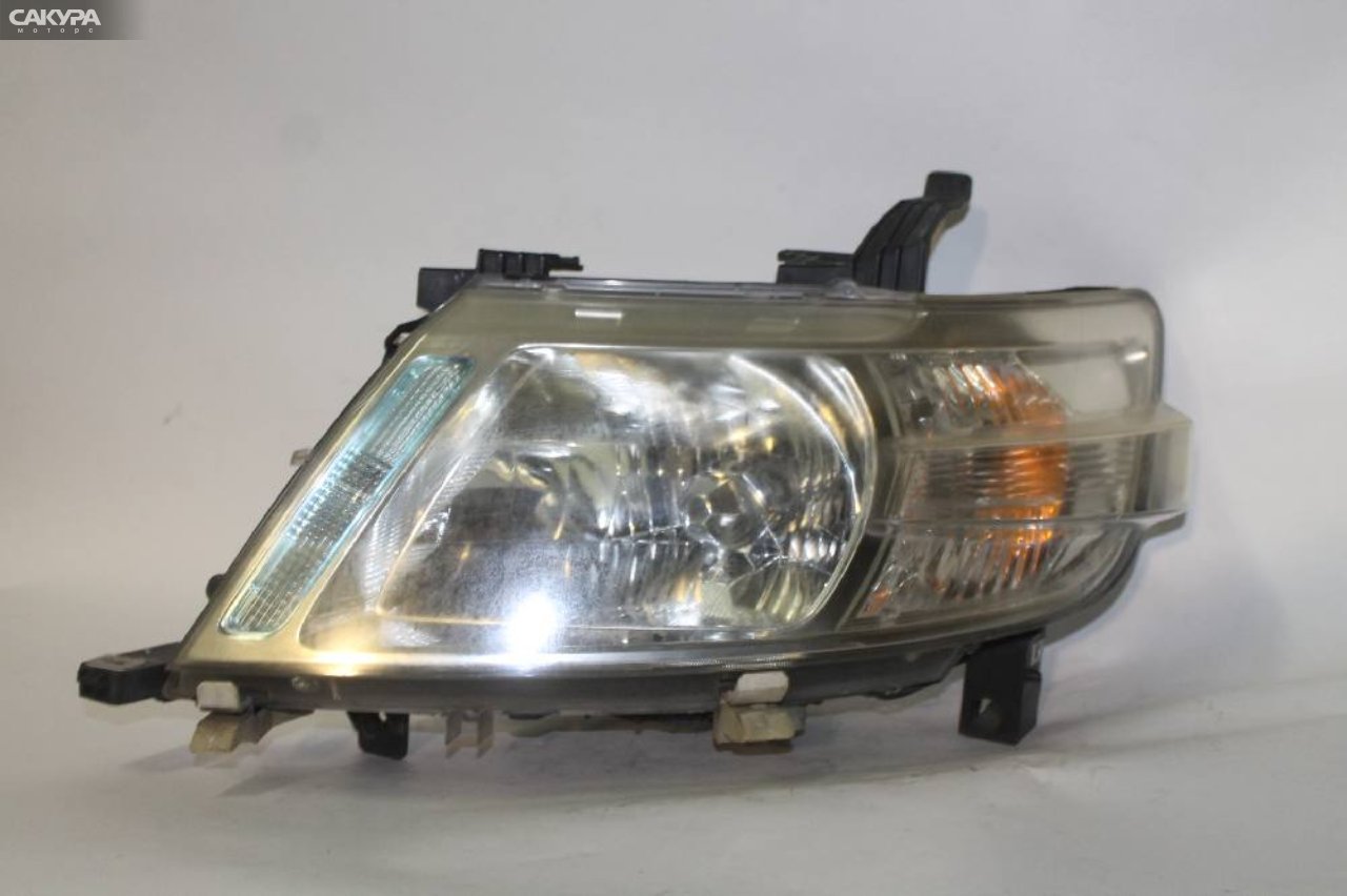 Фара левая Nissan Serena C25 100-24859: купить в Сакура Красноярск.