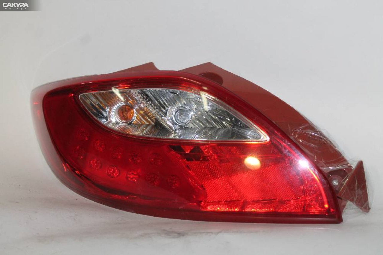 Фонарь стоп-сигнала левый Mazda Demio DE3FS P5776: купить в Сакура Красноярск.