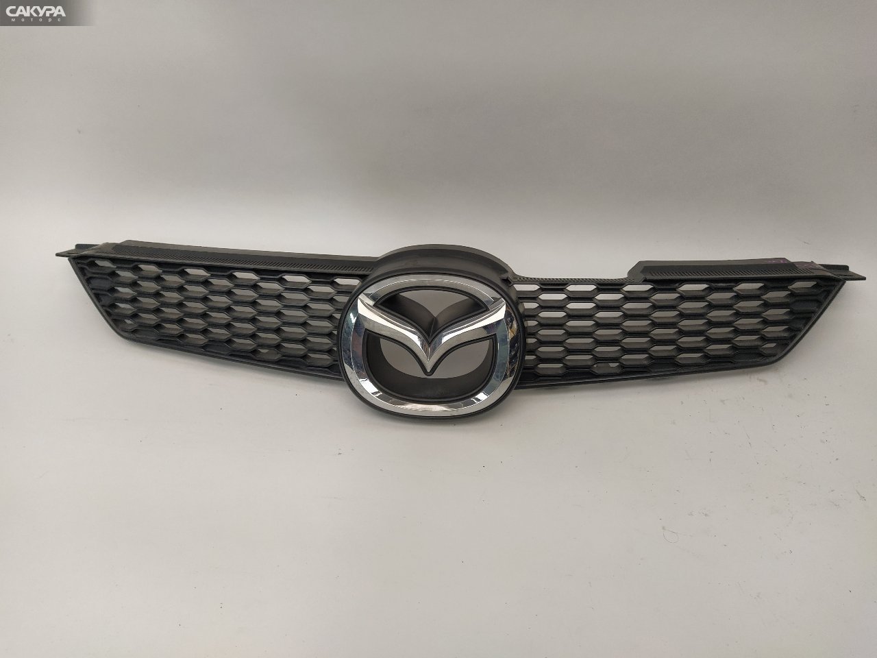 Решетка радиатора Mazda Demio DY3W ZJ-VE: купить в Сакура Красноярск.