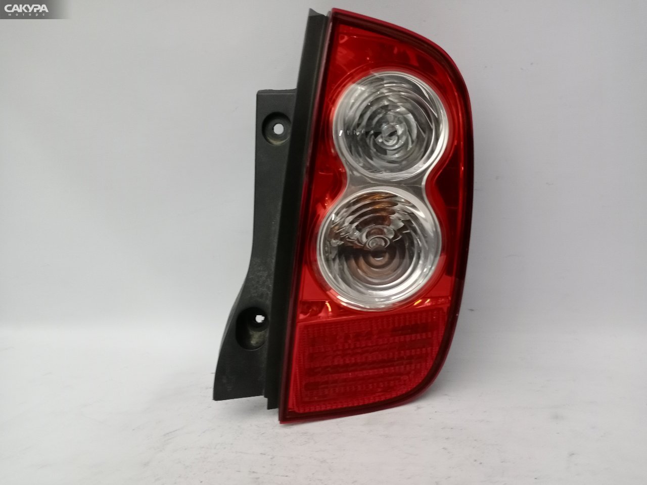 Фонарь стоп-сигнала правый Nissan March AK12 CR12DE D019: купить в Сакура Красноярск.