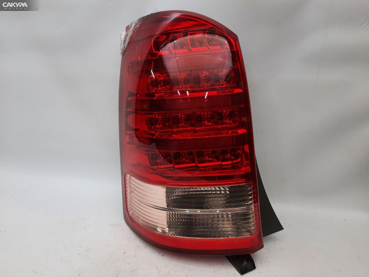 Фонарь стоп-сигнала левый Toyota Wish ZNE10G 68-14: купить в Сакура Красноярск.