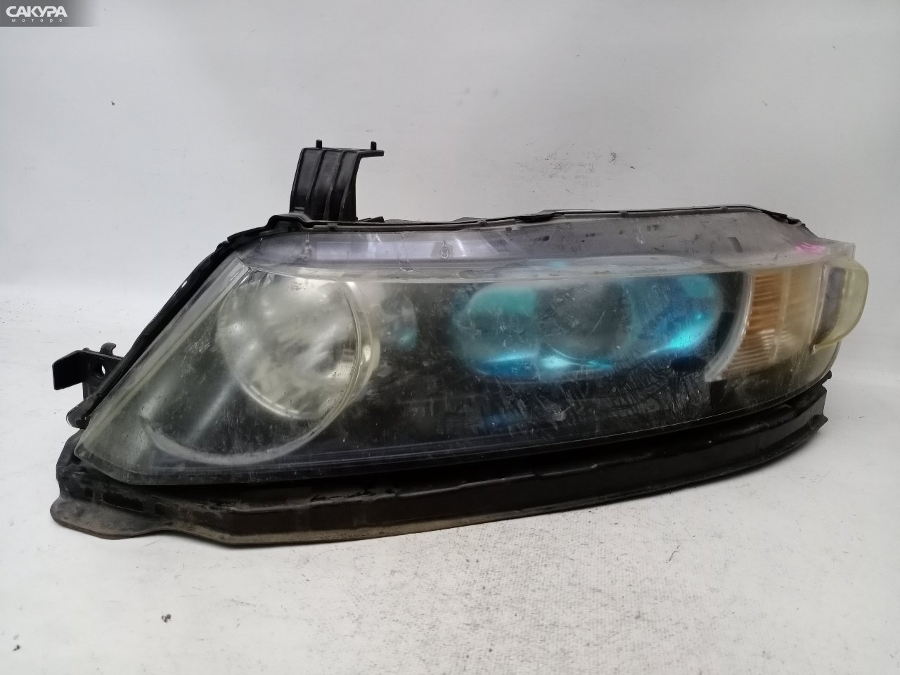 Фара левая Honda Odyssey RB1 K24A 100-22497: купить в Сакура Красноярск.
