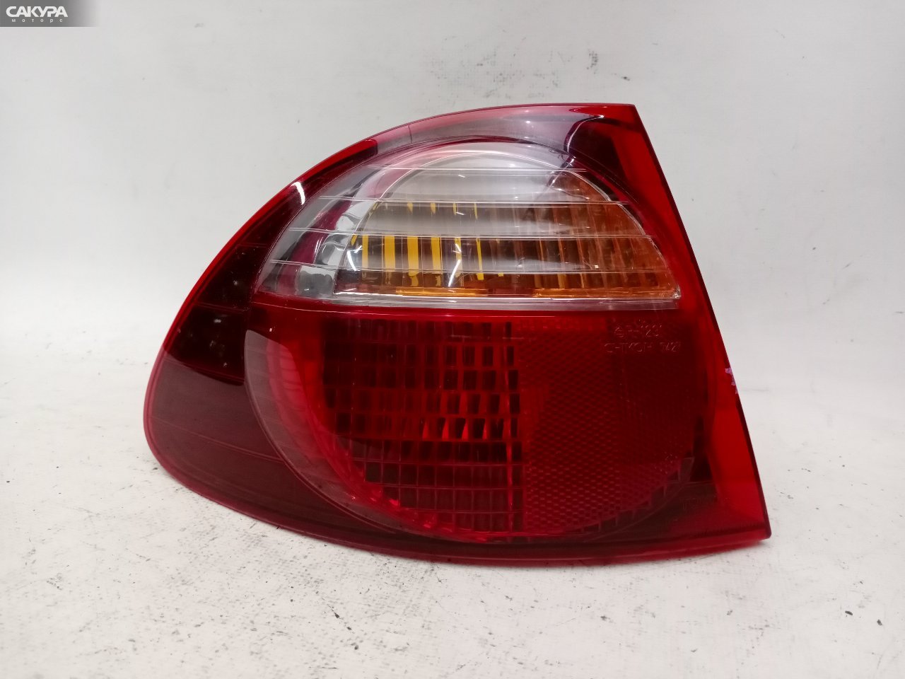 Фонарь стоп-сигнала левый Toyota Caldina ST215G 21-42: купить в Сакура Красноярск.