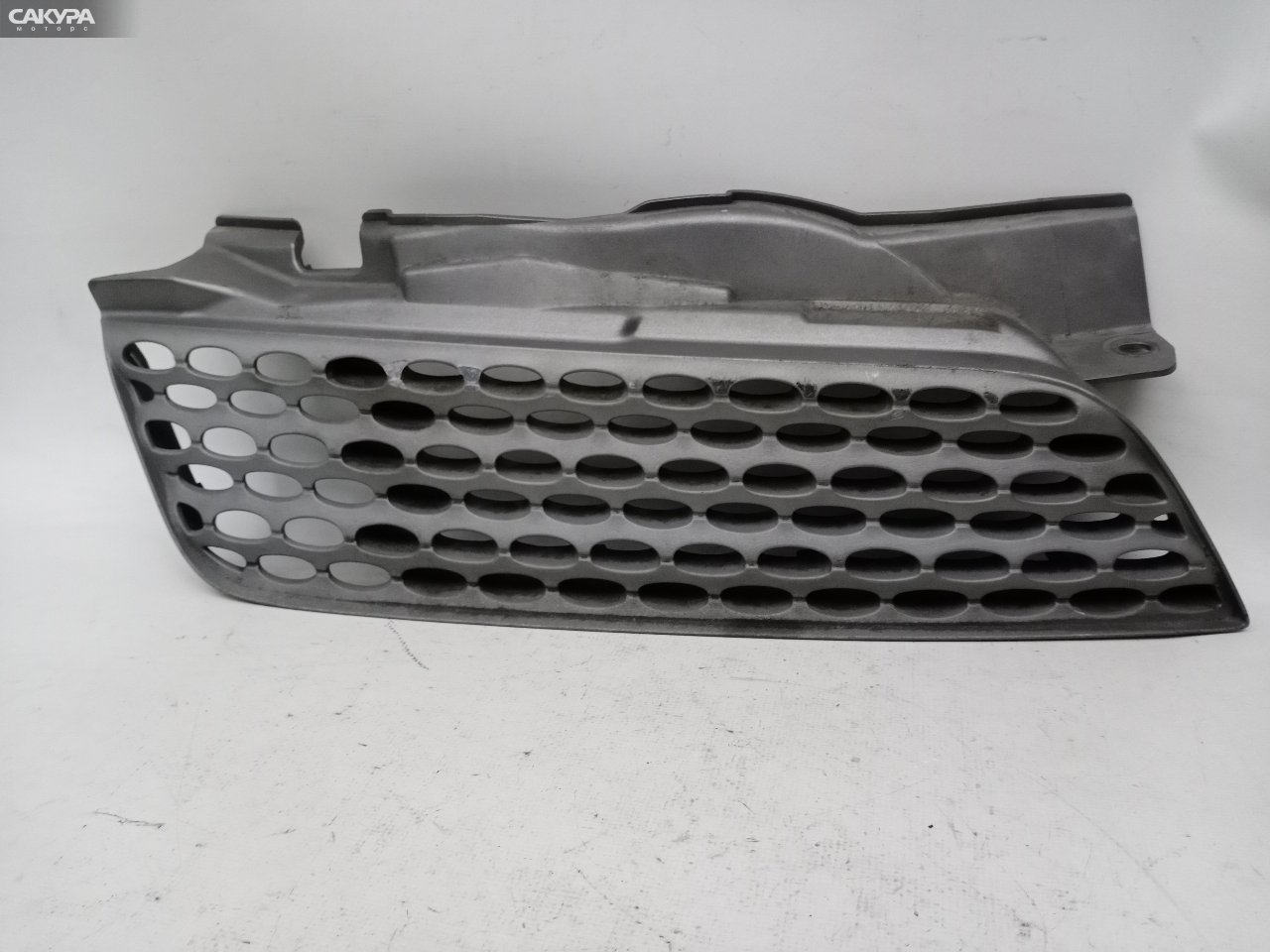 Решетка радиатора правая Nissan March AK12 CR12DE: купить в Сакура Красноярск.