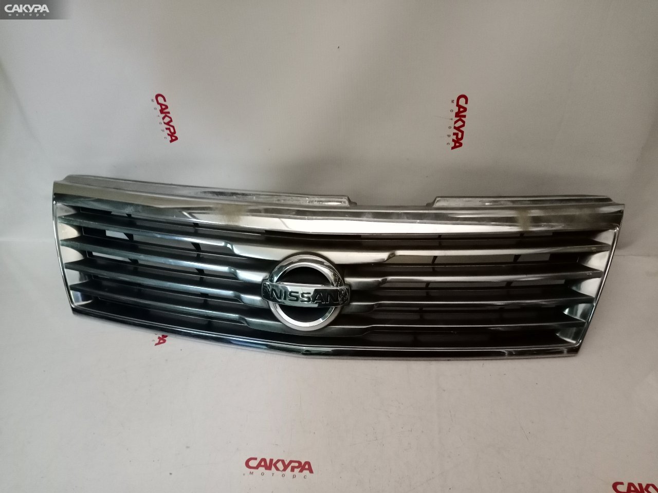 Решетка радиатора Nissan Liberty RM12 QR20DE: купить в Сакура Красноярск.