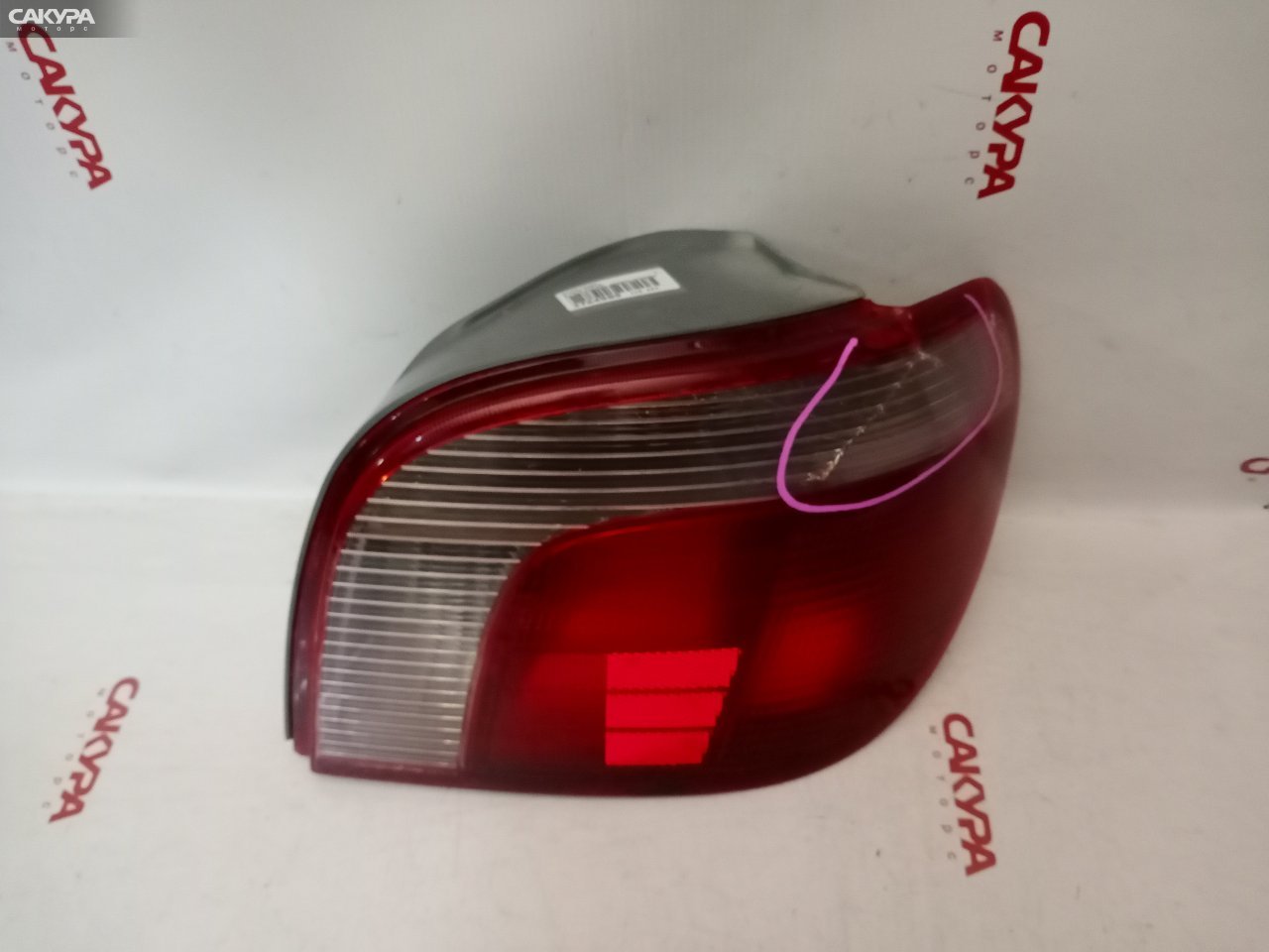 Фонарь стоп-сигнала правый Toyota Vitz SCP10 1SZ-FE 52-004: купить в Сакура Красноярск.