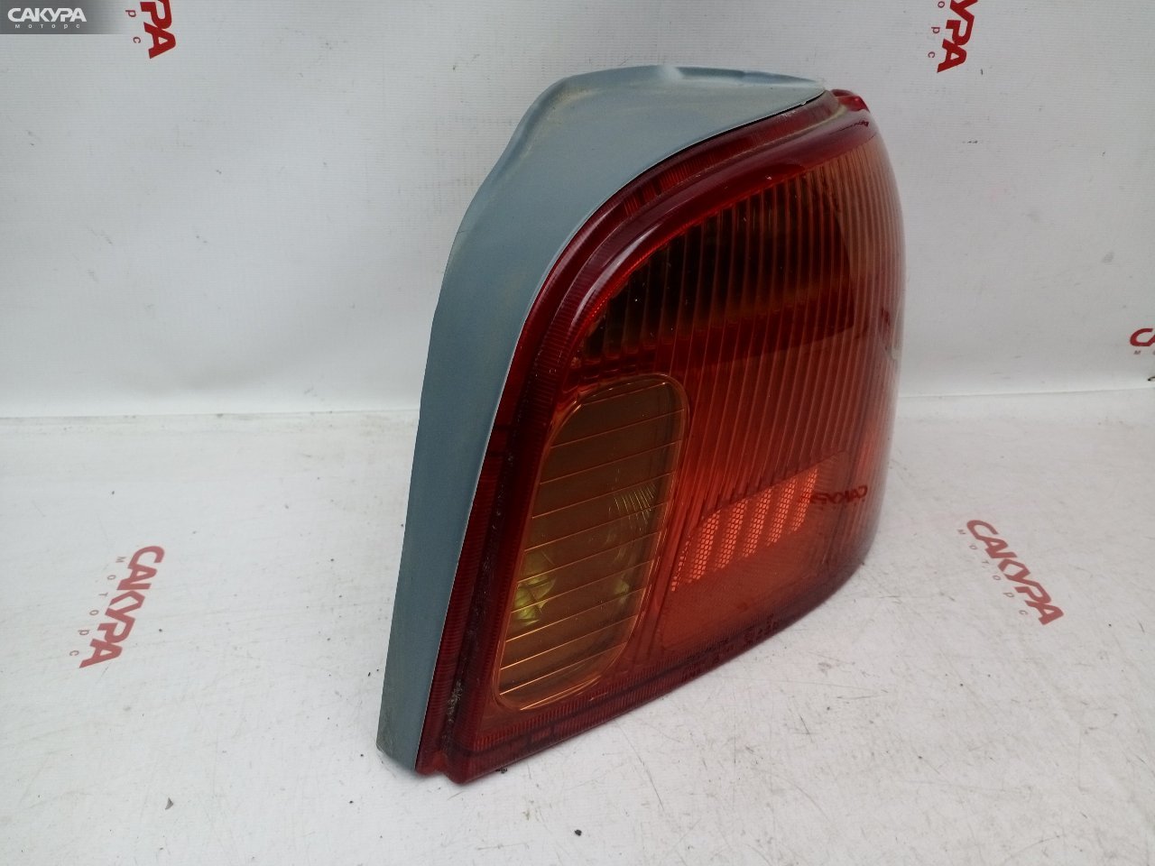 Фонарь стоп-сигнала правый Toyota Vitz NCP10 2NZ-FE 52-049: купить в Сакура Красноярск.