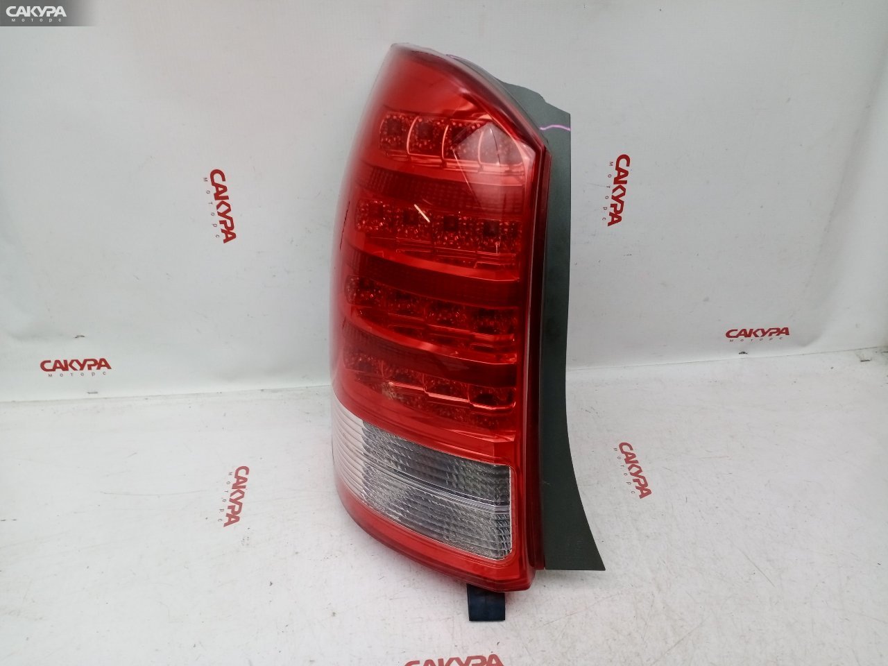 Фонарь стоп-сигнала левый Toyota Wish ZNE10G 1ZZ-FE 68-14: купить в Сакура Красноярск.