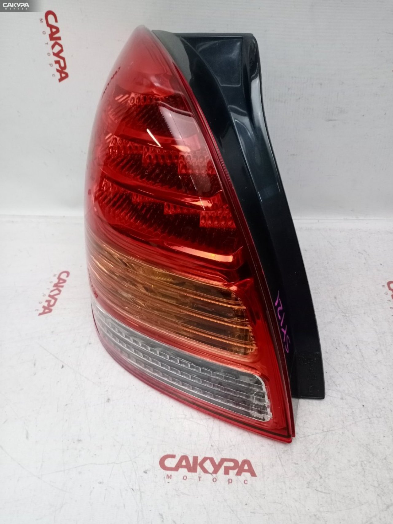 Фонарь стоп-сигнала левый Toyota Corolla Spacio ZZE122N 1ZZ-FE 13-96: купить в Сакура Красноярск.
